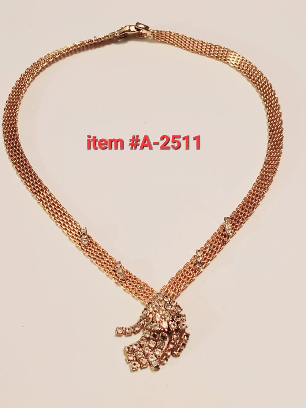 1 Gold Belt Necklace with diamonds stones tassel , item # A-2512. wt. 23 grams.